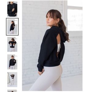 Black ribbed hoodie with cut out design on back size medium